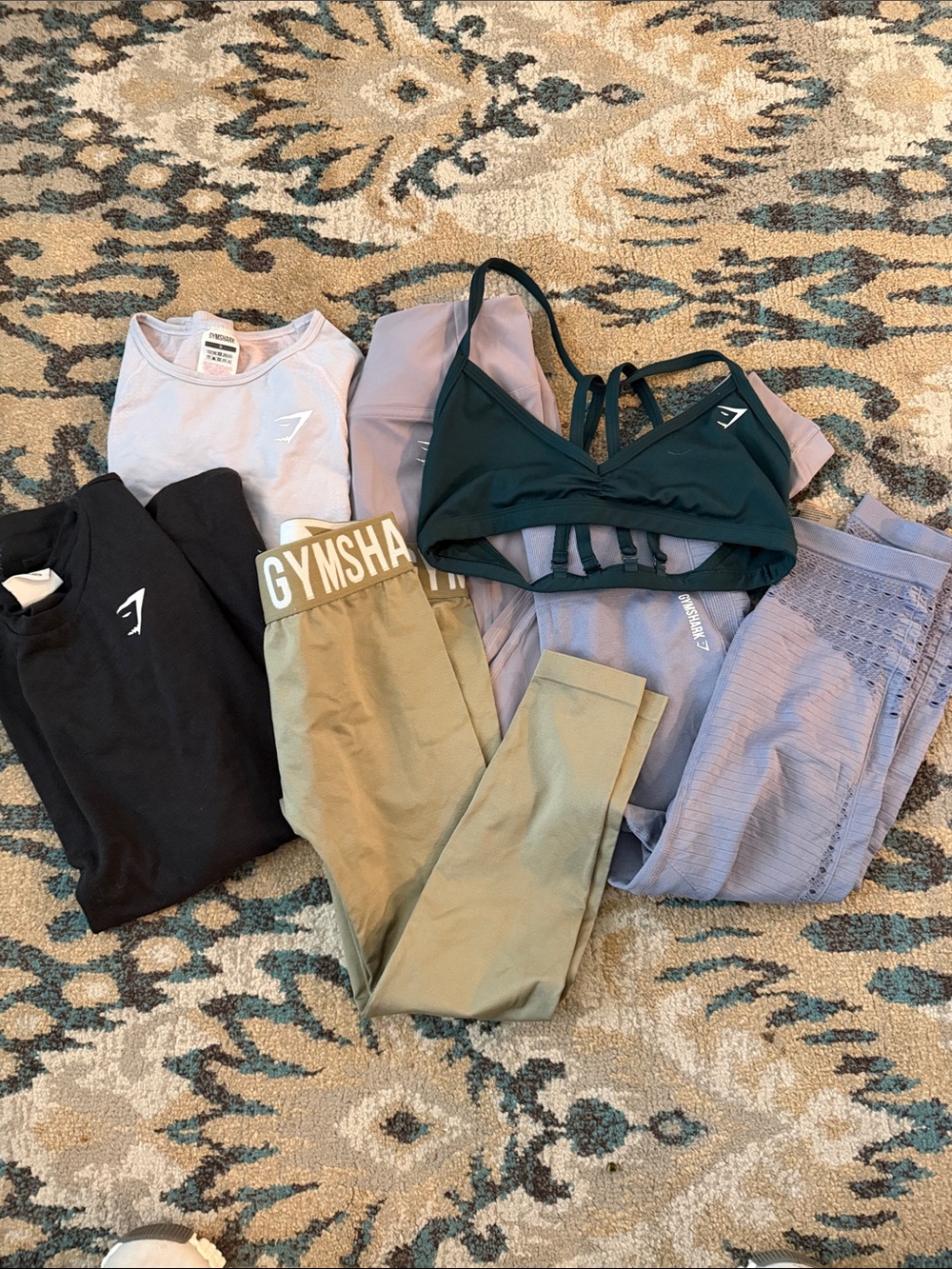 Bundle of Gymshark 3 leggings 1 bra, 1 Tee 1 crop top.